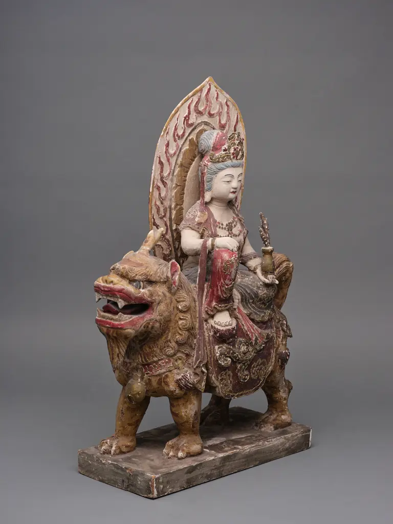 Chinese wood and gesso Buddha figure seated on mythological lion dog, Image 1++
